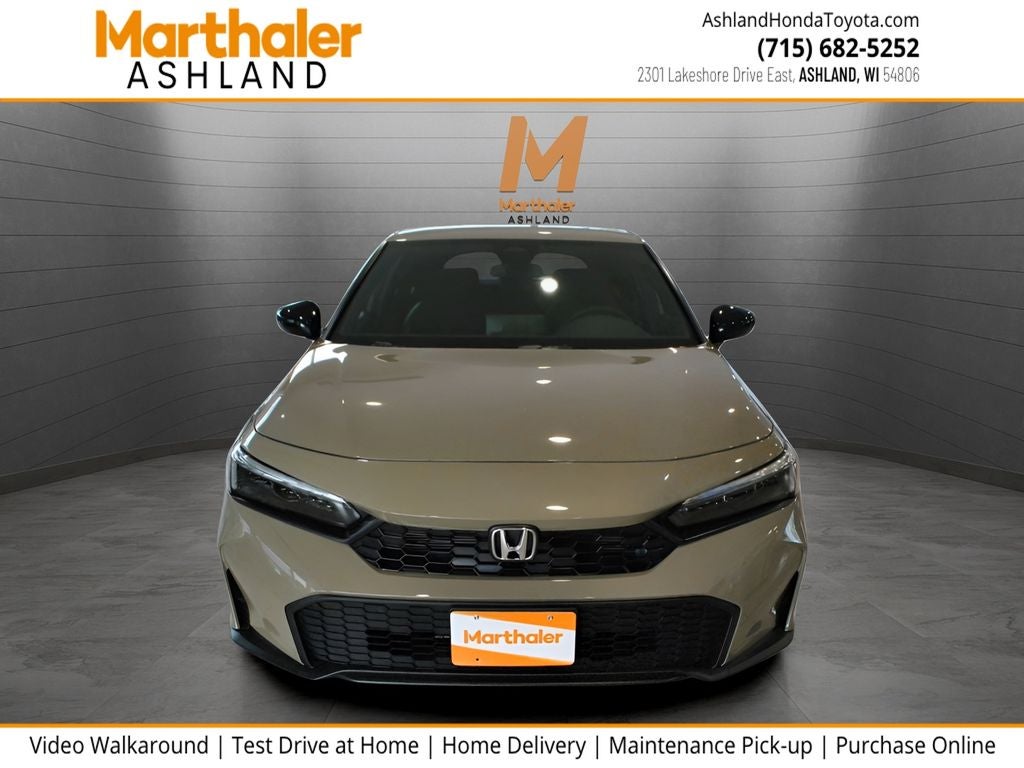 2026 Honda Civic Hybrid Sport Touring in Sand Dune Pearl — front three-quarter view