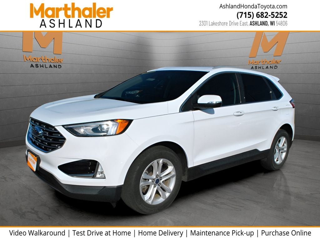 2020 Ford Edge SEL AWD in Oxford White — front three-quarter view