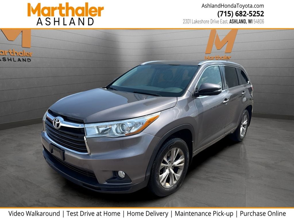2015 Toyota HIGHLANDER XLE V6 AWD in Predawn Gray Mica — front three-quarter view