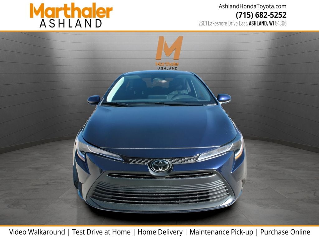 2026 Toyota Corolla LE in Blueprint — front three-quarter view