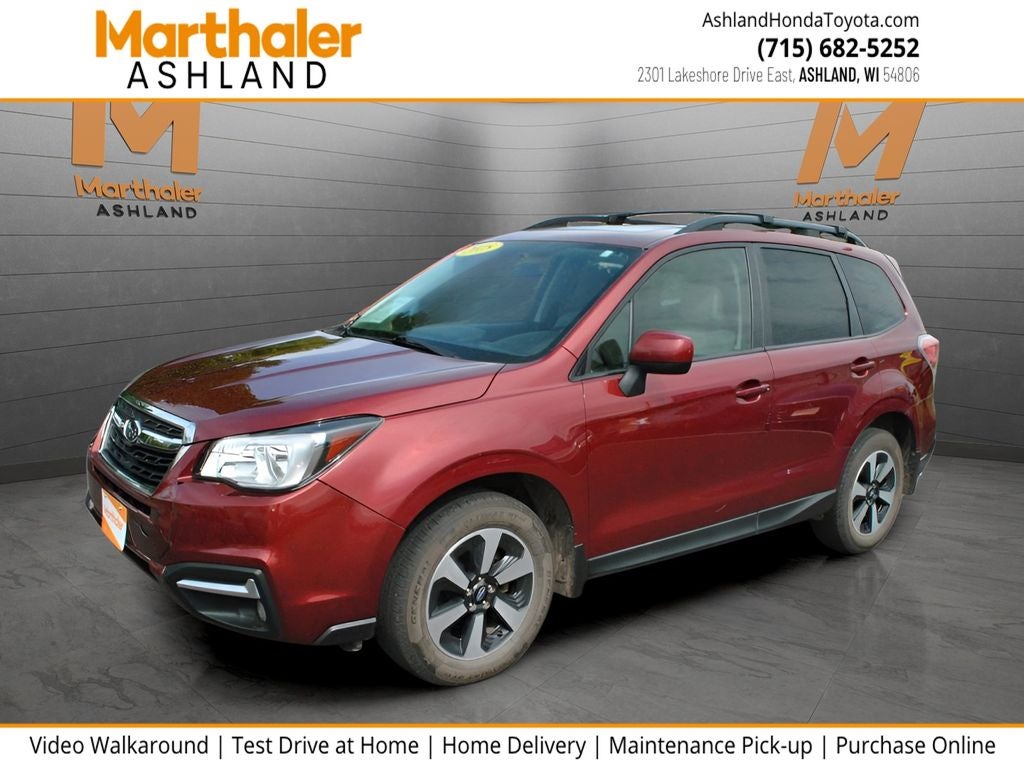 2018 Subaru Forester 2.5i Premium AWD in Venetian Red Pearl — front three-quarter view